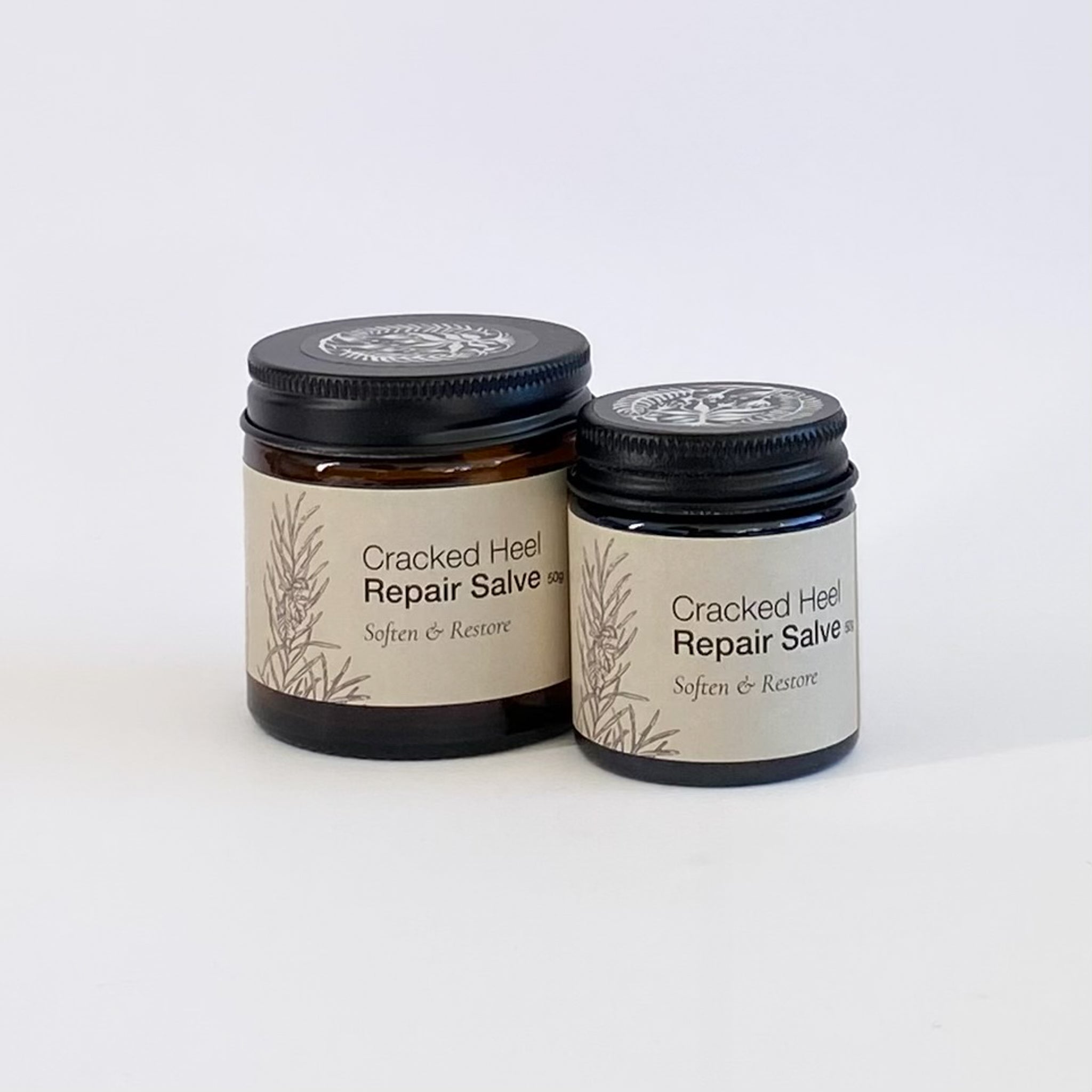 Cracked heel repair balm, two jars on a white background